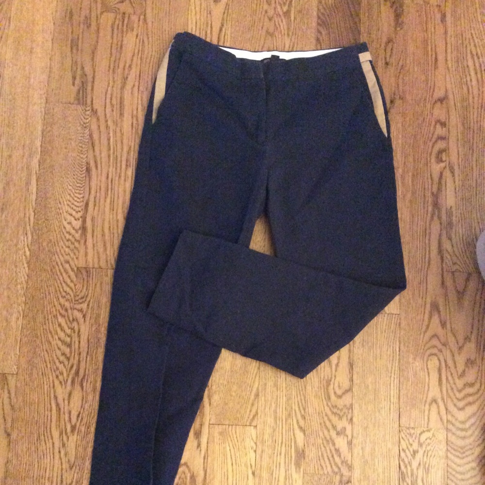 Navy pants with khaki side detail.